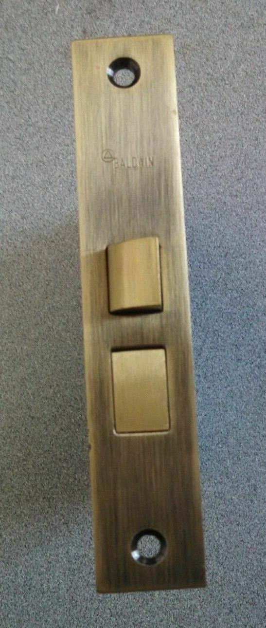 BALDWIN PRIVACY MADRID MORTISE SET IN DISTRESSED HAMMERED ANTIQUES BRASS PRIVACY