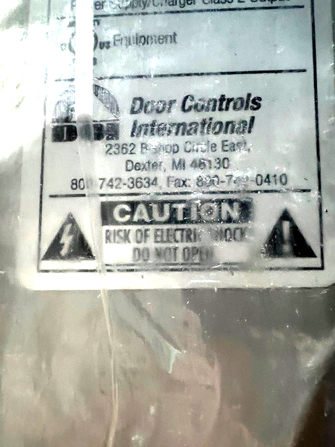 DCI DOOR CONTROLS INTERNATIONAL PS17 12/24VDC SWITCHABLE, NOS