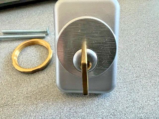 LOCKSMITH MORTISE CYLINDER ESCUTHEON ALUM WITH LOCK RING, LESS CYINDER