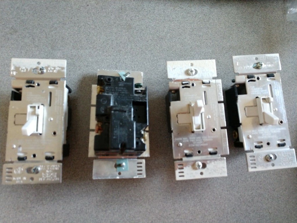 4 USED LIGHT DIMMERS (NOT LED COMPATABLE)
